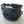 Load image into Gallery viewer, Black leather cuff with metal buckle on a light gray background
