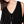Load image into Gallery viewer, Person wearing a black top with a long silver necklace featuring a art nouveau perfume bottle pendant.
