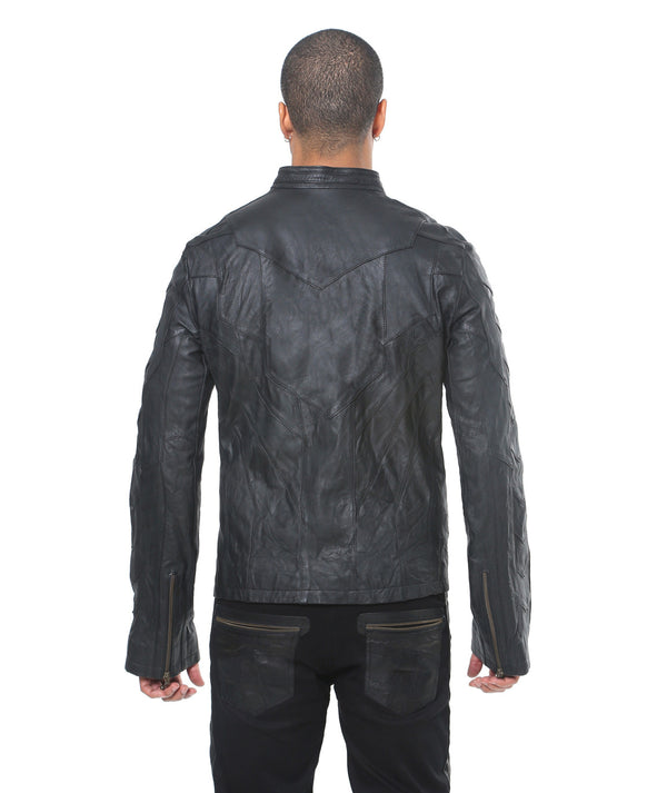 This image features a stylish "Hornet Jacket" modeled by a male. The jacket is crafted from black leather and features a slim fitting design, highlighting a modern and sleek look.