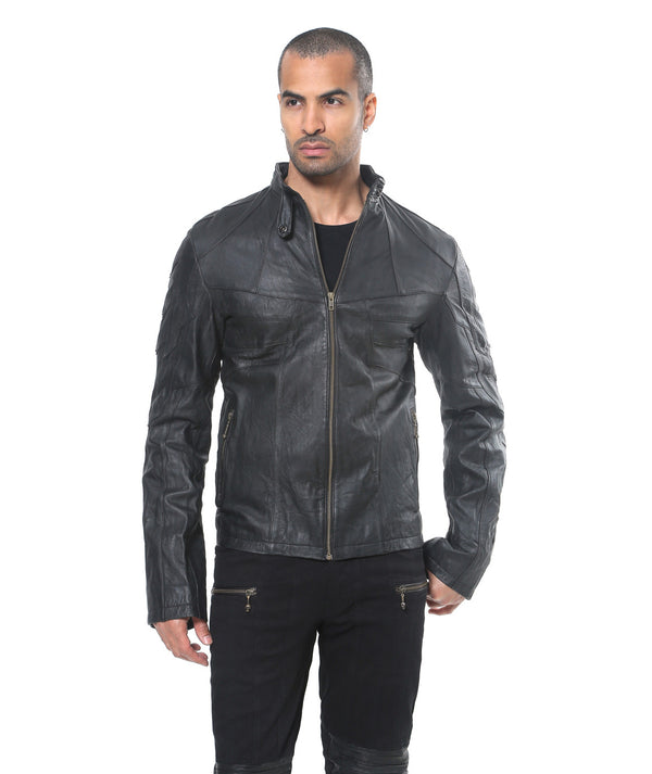 This image features a stylish "Hornet Jacket" modeled by a male. The jacket is crafted from black leather and features a slim fitting design, highlighting a modern and sleek look.