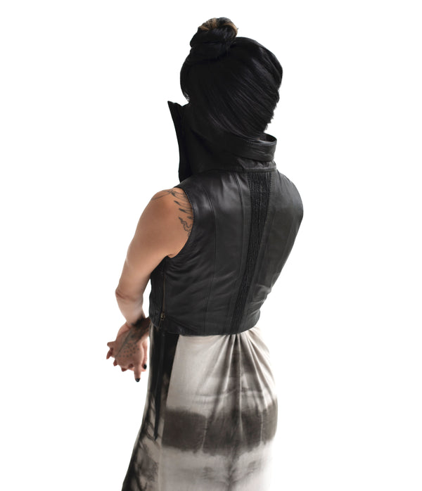 sculptural lambskin sleeveless vest with high flared collar,